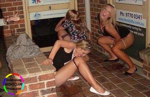 Classy Aussie girls pissing outside of the club.