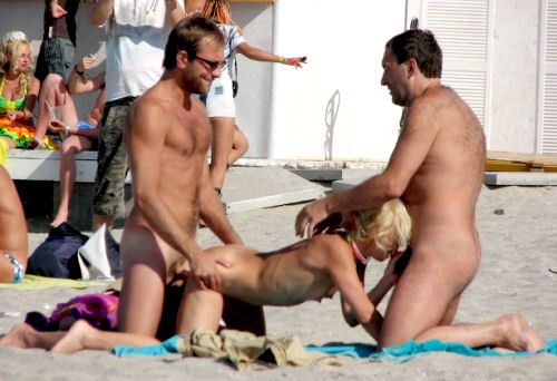 Russian wife spit roasted on the beach by her husband and stranger who can't believe his luck.