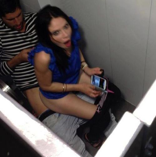 Her phone went off and got her caught getting fucked in the men's room.