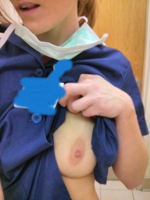 Nurse flashing tit