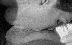 Taking it deep down her throat