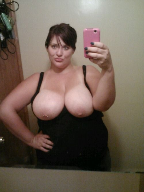 Cute chick taking a selfire