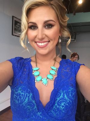 Beautiful. Especially when looking up at my me with my cock in her mouth and cum on her face