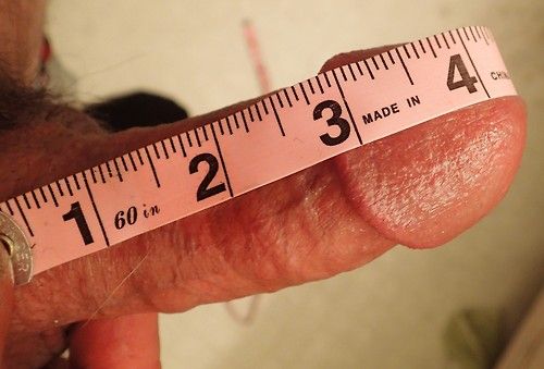 Measuring his tiny pathetic dick LOL