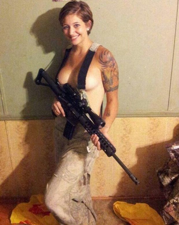 Army girl with her weapon