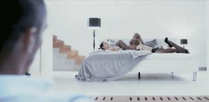 Lesbians have oral sex in front of man