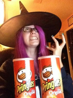 Nerdy Halloween witch wearing glasses