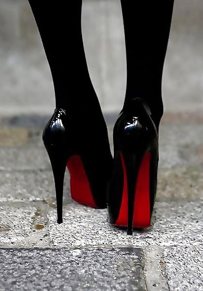 red sole high heels worn by Nylon Lady