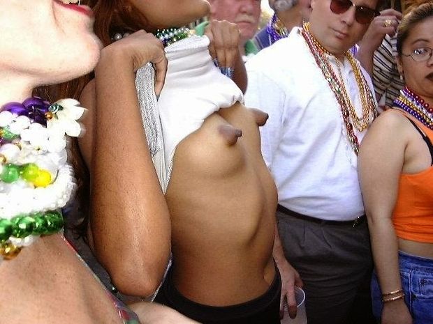 Innocent girl psing nude in public showing her big and hard nipples