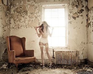 Sophie on an abandoned mental asylum.