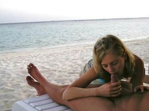 Blowjob On The Beach