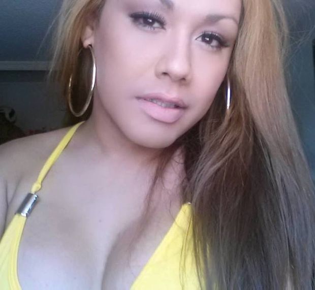 Brunette shemale cam girl in yellow bra and fake tits