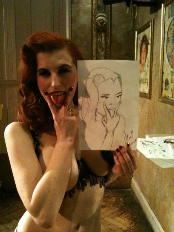 Sophia St. Villier with her favourite portrait of the night. To me, it evokes Ann-Margrock (aka that other red-haired vixen, Ann-Margret) fr