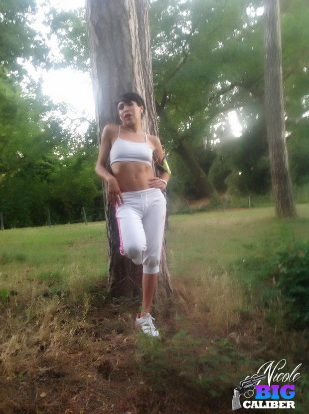 T-GIRL Nicole Big Caliber flashing her dick in the woods