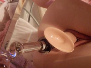 Plugged pussy with glass dildo in ass