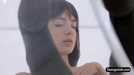 Perky tits teen Kiki rubbing her pussy