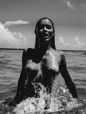 denuded pics of big breasts lady