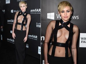 Miley Cyrus dons clevage-baring dress at amfAR.