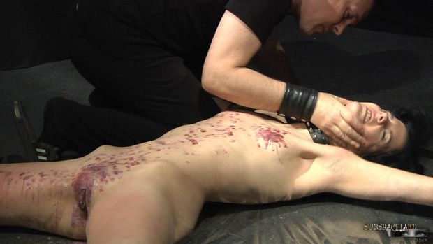 Skinny and fragile, this slave girl is submissive and obedient in a bdsm game where her master dropped hot wax on her body and nasty pussy.