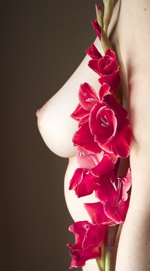 Flowers And A Breast