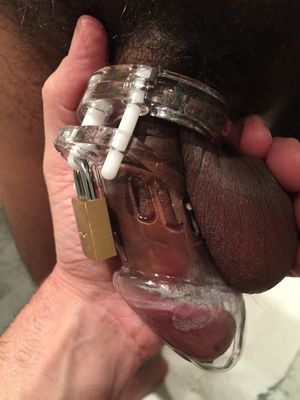 Wow!! I am used to seeing small dick white boys in chastity. But here is a small black caged cock.