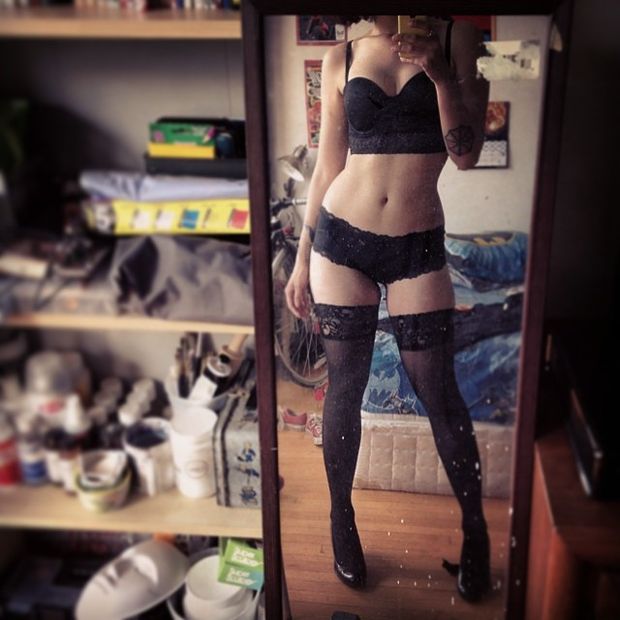 Amateur in black lingerie & stockings