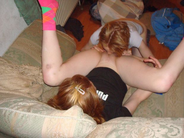 Eating teen redhead on couch