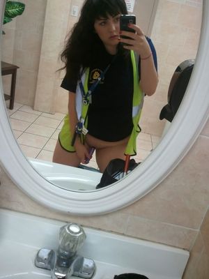 Work vest still on in bathroom toying pussy in mirror