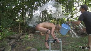 He bathed her with cold water and left her to freeze. This slave girl must endure harsh treatment and cold shivers.