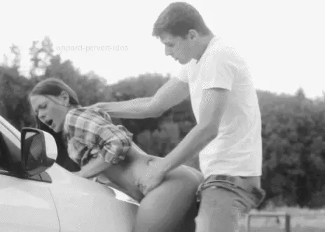 bent over the hood