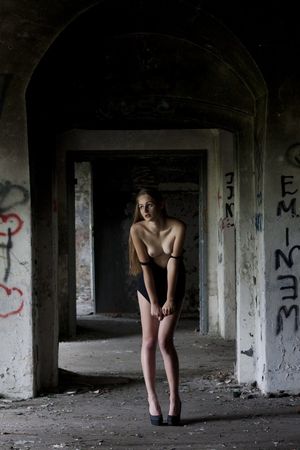 Sensational beauty in body suit.