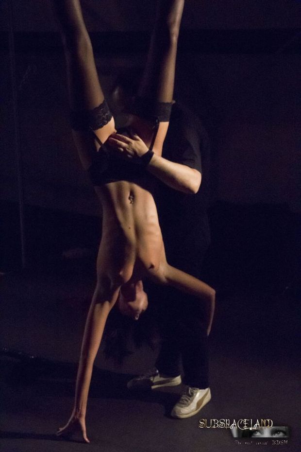 Dark suspension and bdsm whipping for a sexy slave girl