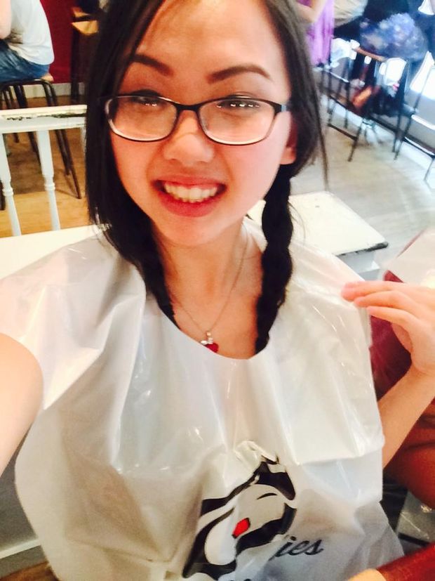 Pigtails, glasses, and a bib, yep she's ready to eat!