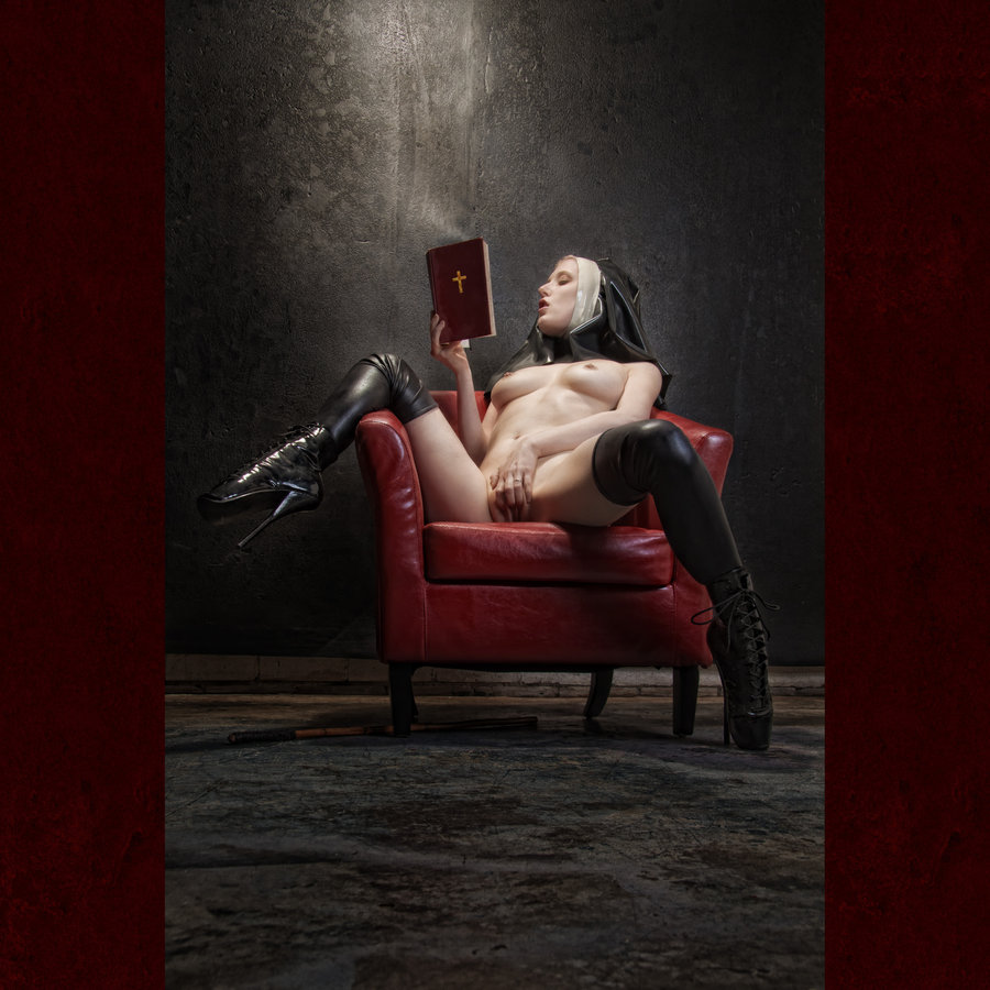 Naughty nun masturbating while reading bible