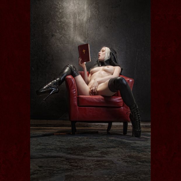 Naughty nun masturbating while reading bible