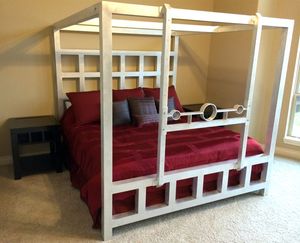 BDSM Bed with stocks