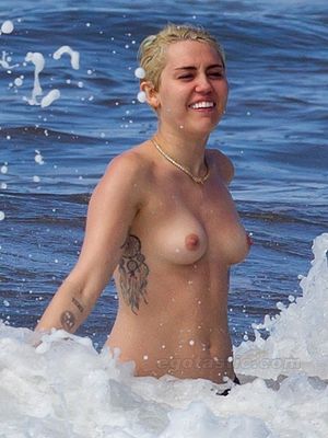 Miley Cyrus Topless at Beach in Hawaii