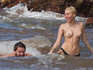 Miley Cyrus Topless at Beach in Hawaii