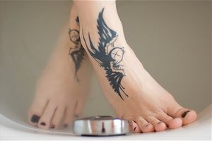 Feet and tattoo