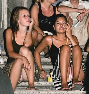 Two cuties with their panties showing