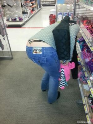 Leopard thong peeking out while shopping