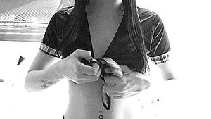 Babe with perfect tits stripping