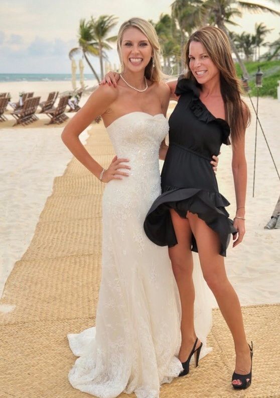 Posing with bride and the wind shows her panties