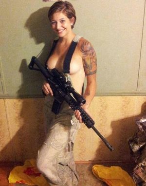 topless soldier girl with gun