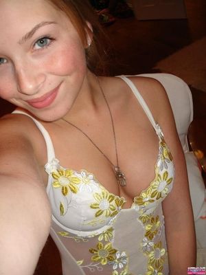 Cute redhead in lingerie