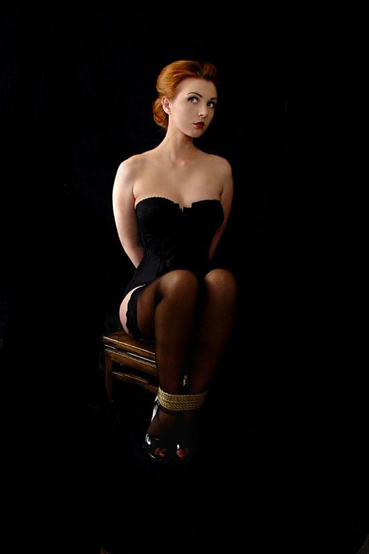 #demure #bondage #redhead #corset #stockings #tied #armsback #ropebondage #bdsm #lipstick #glamour