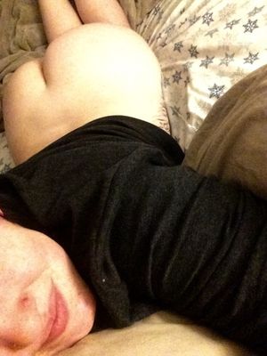 Smiling because I get to stay braless and pants less in bed on...