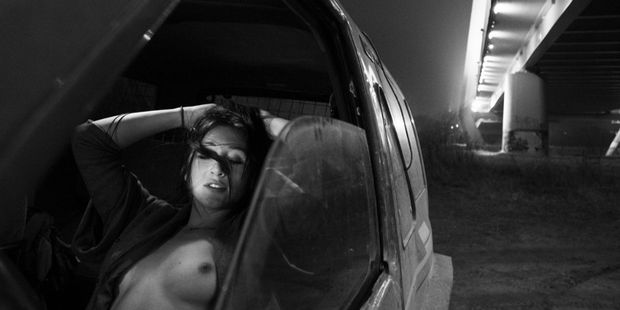 Teasing inside car.