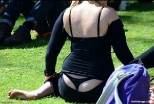 Women with big ass airing out her thong