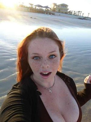 Sexy redhead with tons of freckles